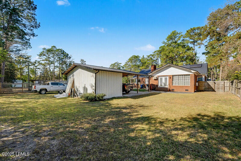 411 Willard Street Hampton, SC 29924 - Photo 37 of 43 back carport