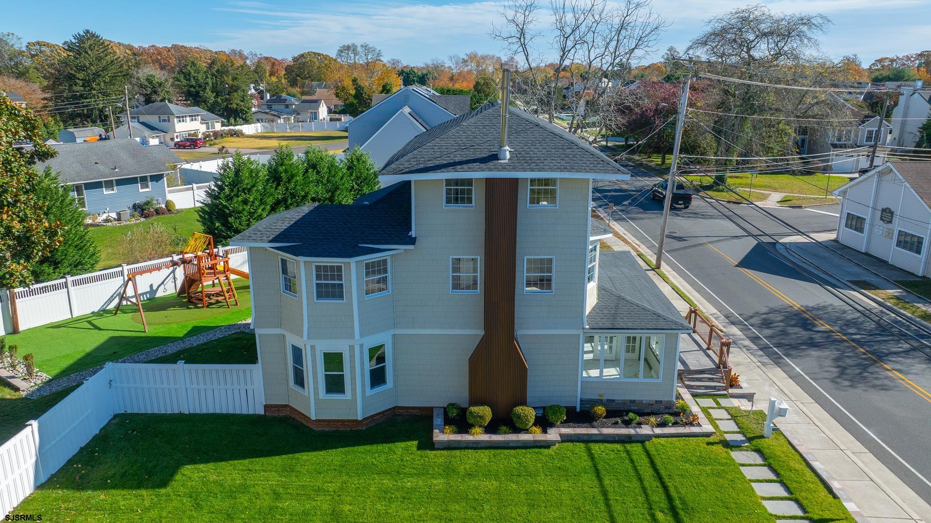 1203 West Mill Road Northfield, NJ 08225 - Photo 64 of 90 a view of a house with a swimming pool