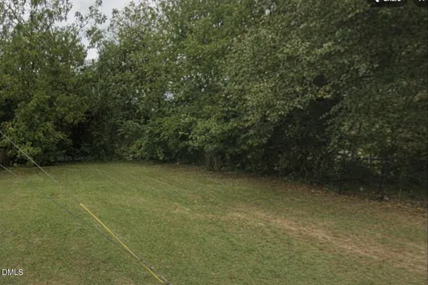 a view of a room with a trees