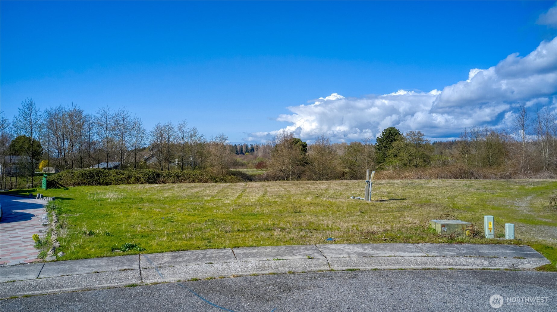 a view of a lake with a big yard