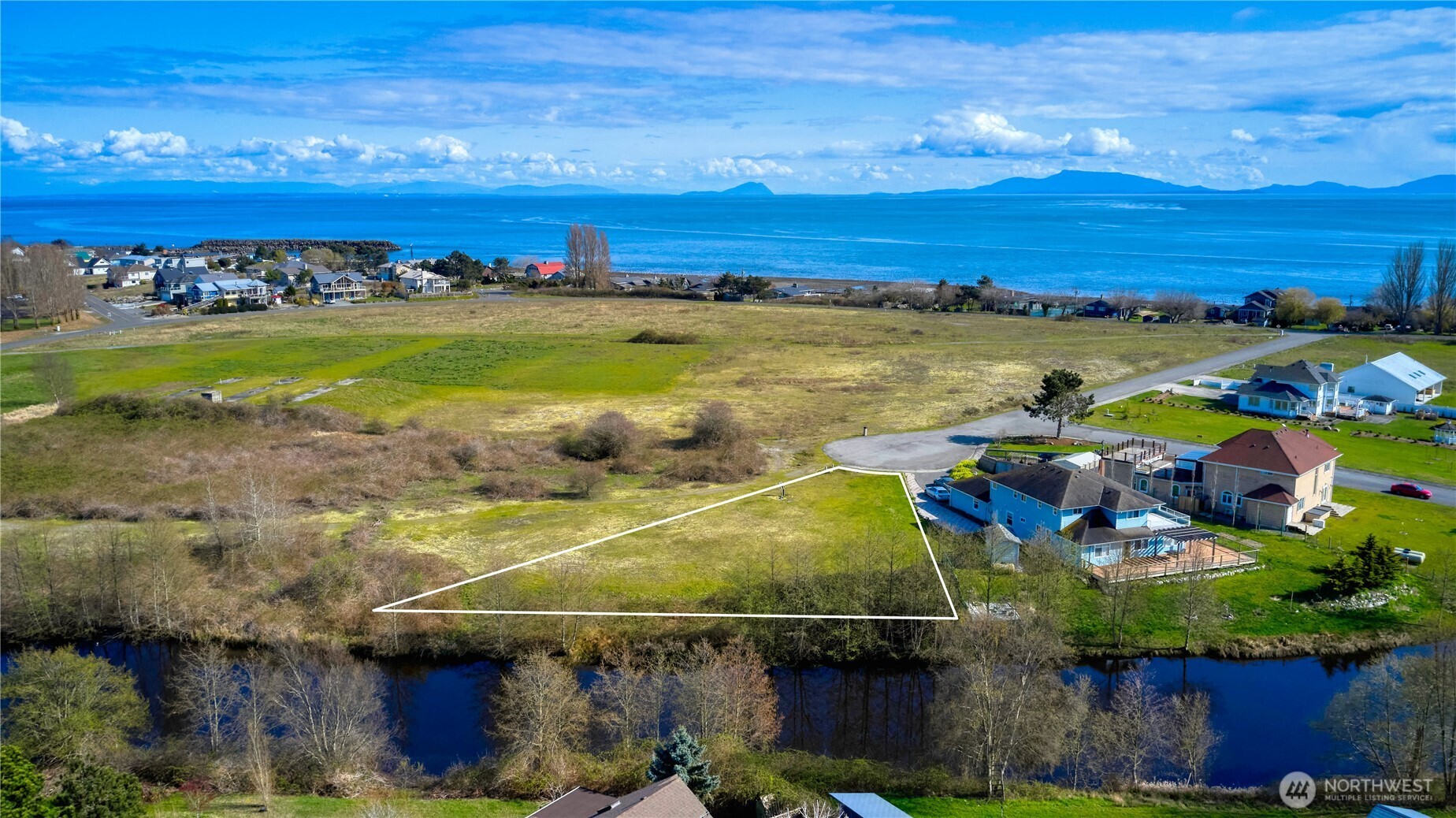 721 Ocean View Court Point Roberts, WA 98281 - Photo 3 of 8 a view of an ocean and beach
