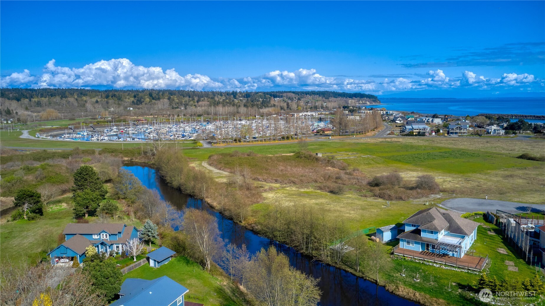 721 Ocean View Court Point Roberts, WA 98281 - Photo 6 of 8 a view of a city with swimming pool