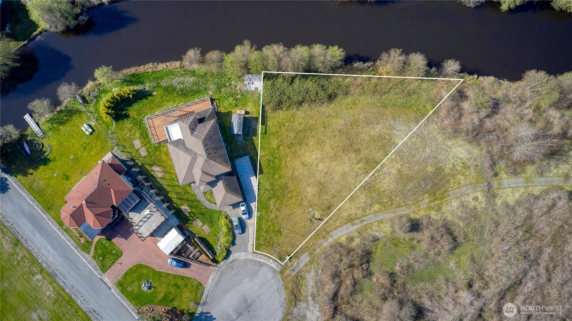 721 Ocean View Court Point Roberts, WA 98281 - Photo 7 of 8 an aerial view of a house with a yard
