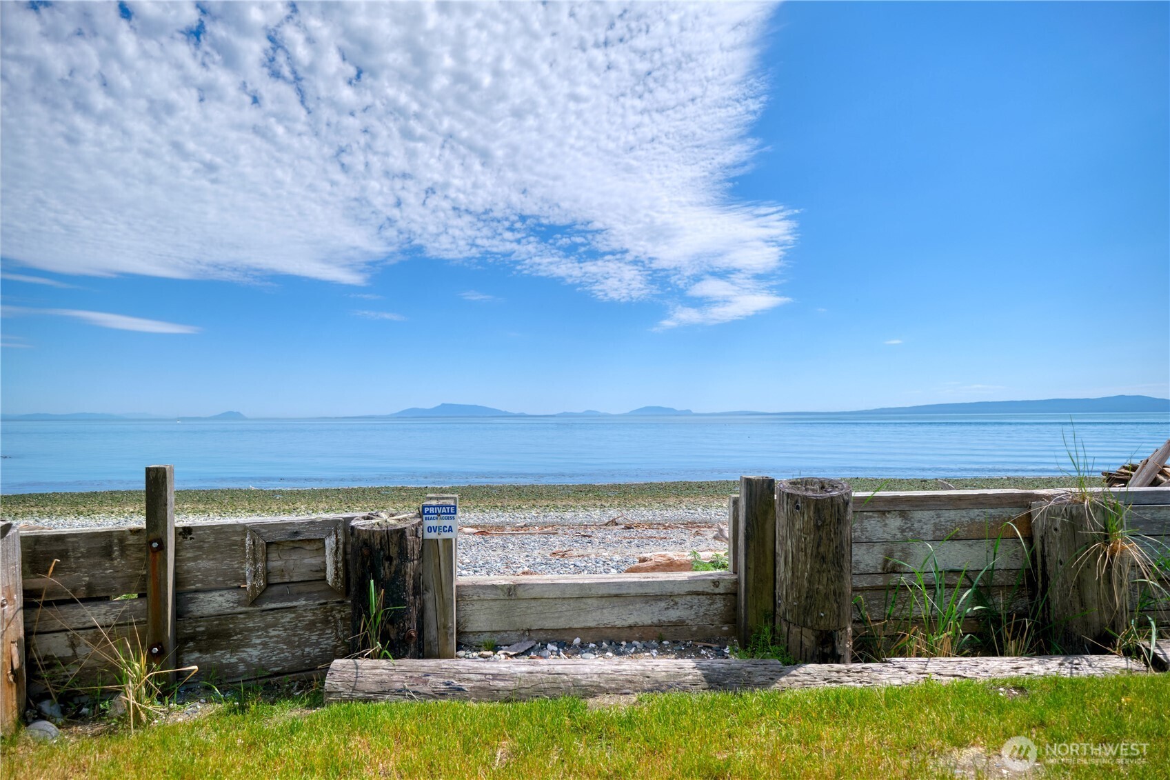 721 Ocean View Court Point Roberts, WA 98281 - Photo 8 of 8 a view of swimming pool with lawn chairs and large tree