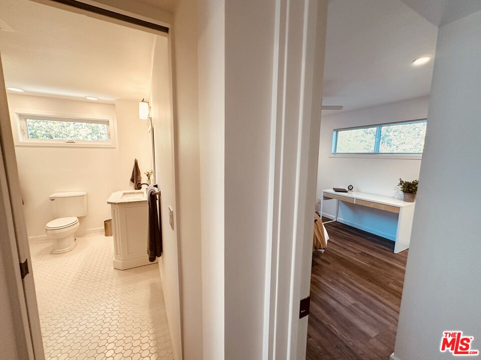 2039 Tuna Canyon Road, Unit B Topanga, CA 90290 - Photo 11 of 19 a bathroom with a toilet sink and a shower