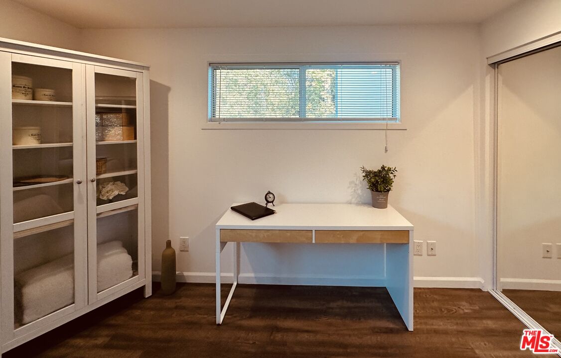 2039 Tuna Canyon Road, Unit B Topanga, CA 90290 - Photo 17 of 19 a dining room with a table and chairs