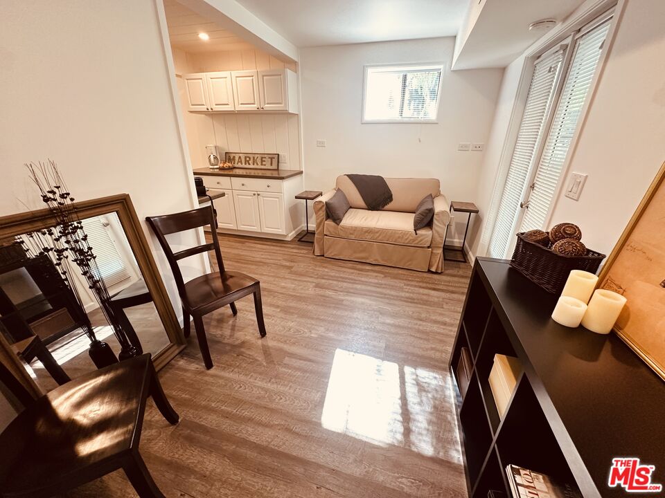 2039 Tuna Canyon Road, Unit B Topanga, CA 90290 - Photo 3 of 19 a living room with furniture and a window