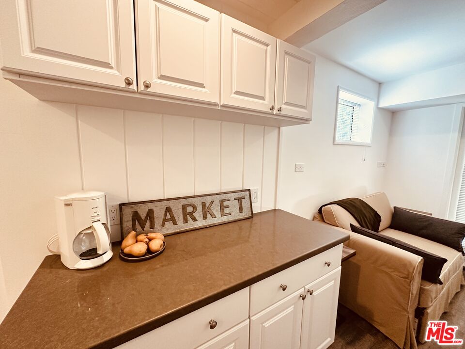 2039 Tuna Canyon Road, Unit B Topanga, CA 90290 - Photo 9 of 19 a kitchen with cabinets and a stove