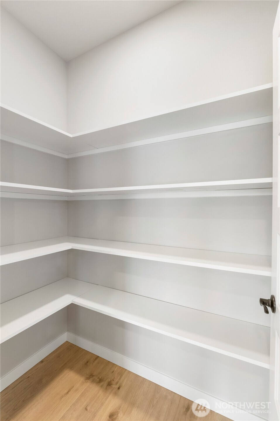 528 Harman Way South Orting, WA 98360 - Photo 13 of 30 a view of a room with shelves