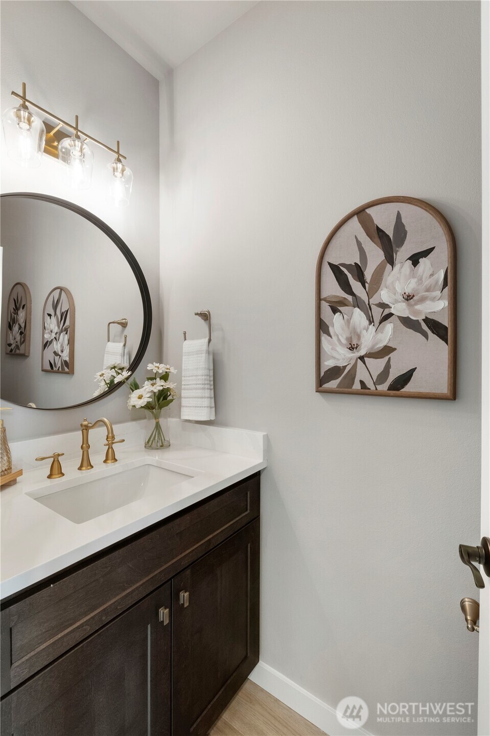 528 Harman Way South Orting, WA 98360 - Photo 15 of 30 a bathroom with a sink and a mirror