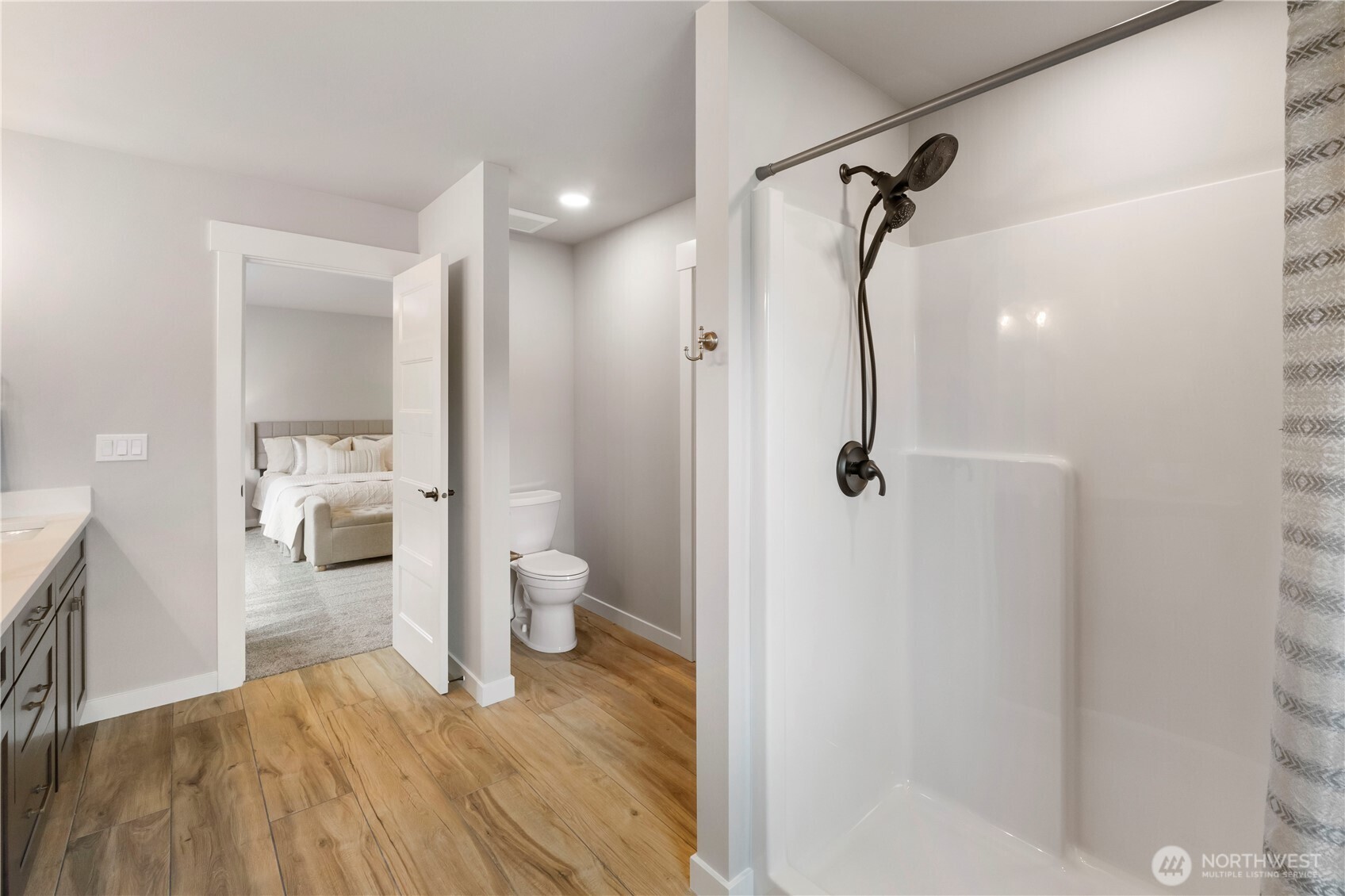 528 Harman Way South Orting, WA 98360 - Photo 19 of 30 a bathroom with a shower and a toilet