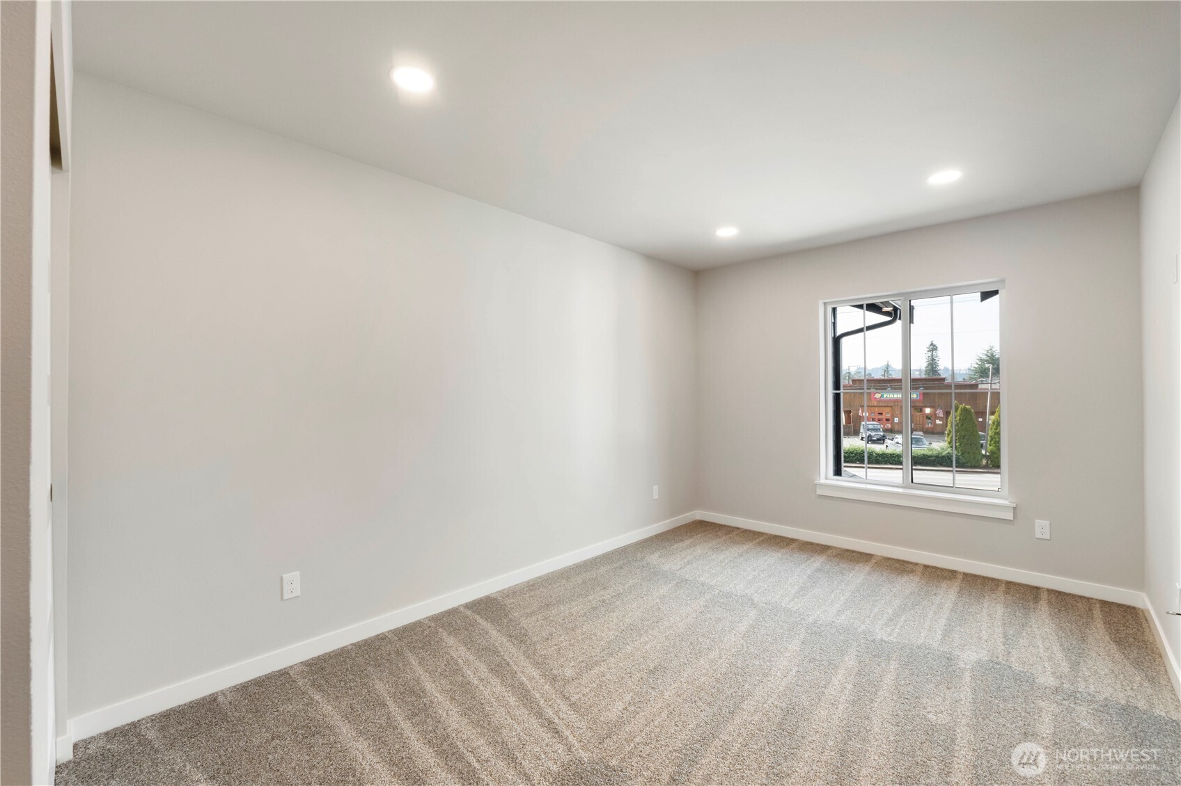 528 Harman Way South Orting, WA 98360 - Photo 21 of 30 an empty room with windows
