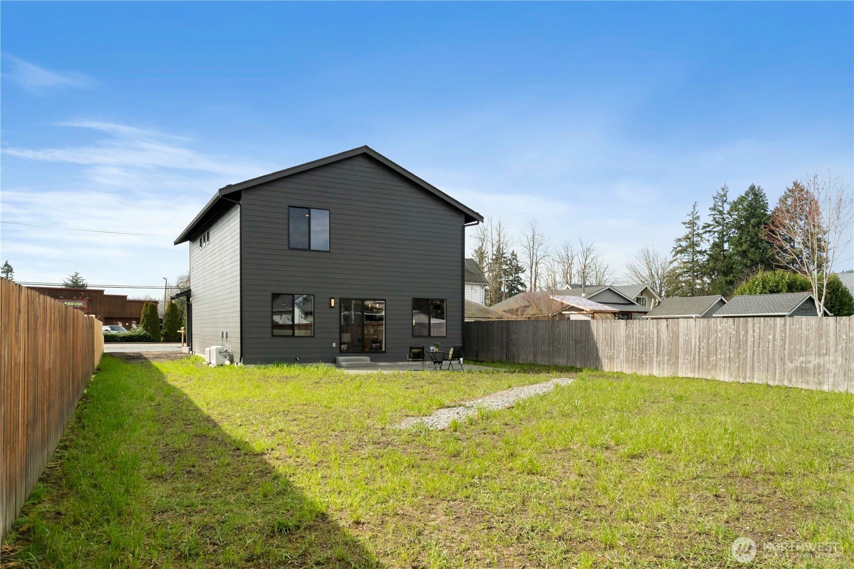 528 Harman Way South Orting, WA 98360 - Photo 29 of 30 a view of a house with a yard and sitting area
