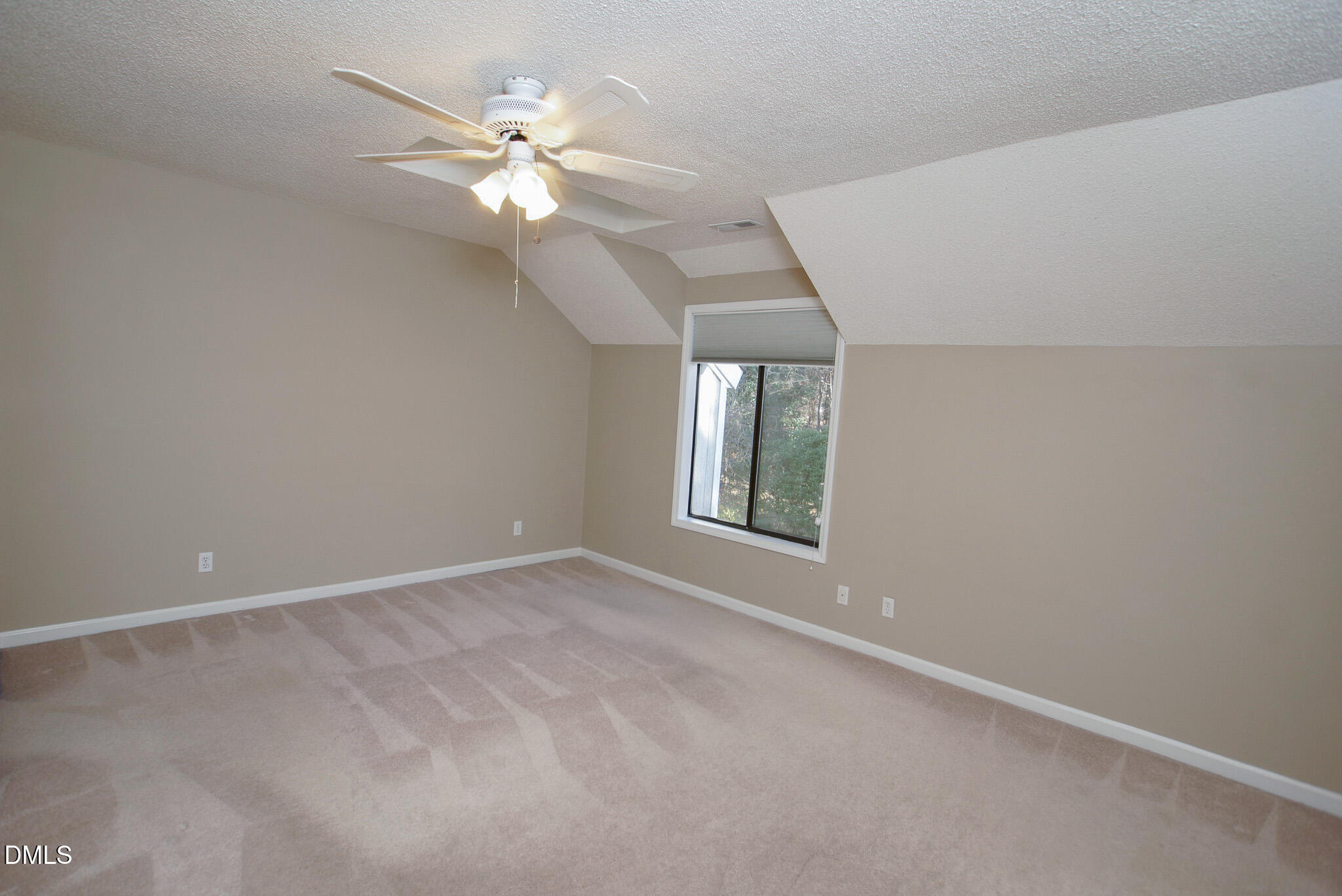 4101 Five Oaks Drive, Unit 10 Durham, NC 27707 - Photo 18 of 29 a view of an empty room with a window