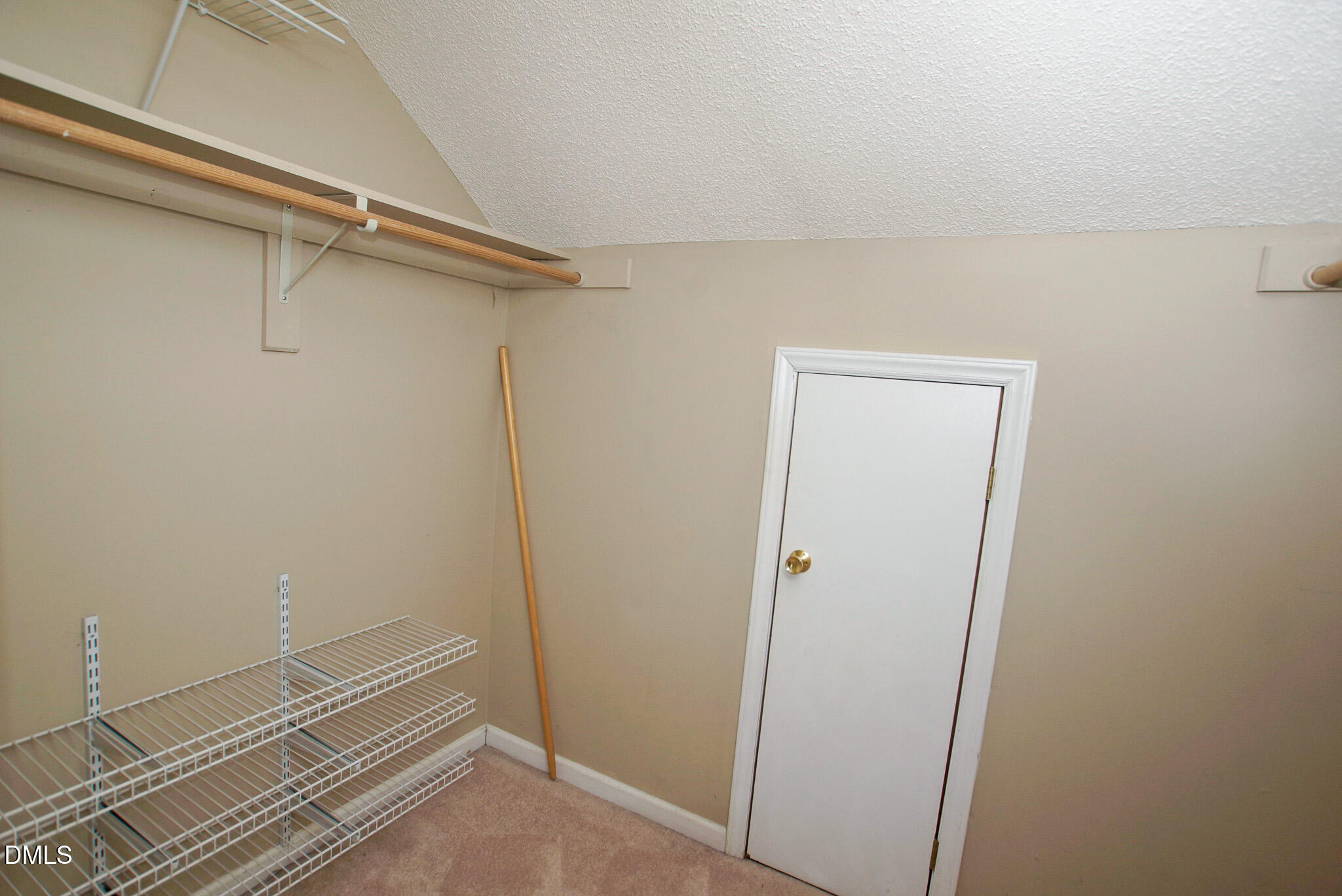 4101 Five Oaks Drive, Unit 10 Durham, NC 27707 - Photo 19 of 29 a view of a room with rack on the wall