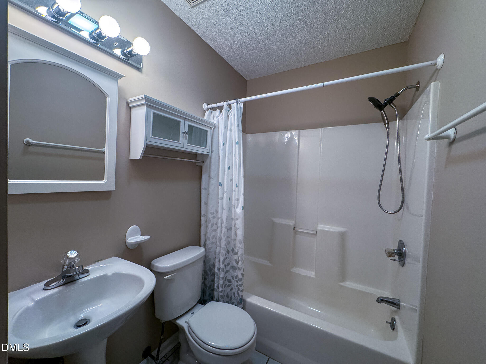 4101 Five Oaks Drive, Unit 10 Durham, NC 27707 - Photo 26 of 29 a bathroom with a sink toilet and shower