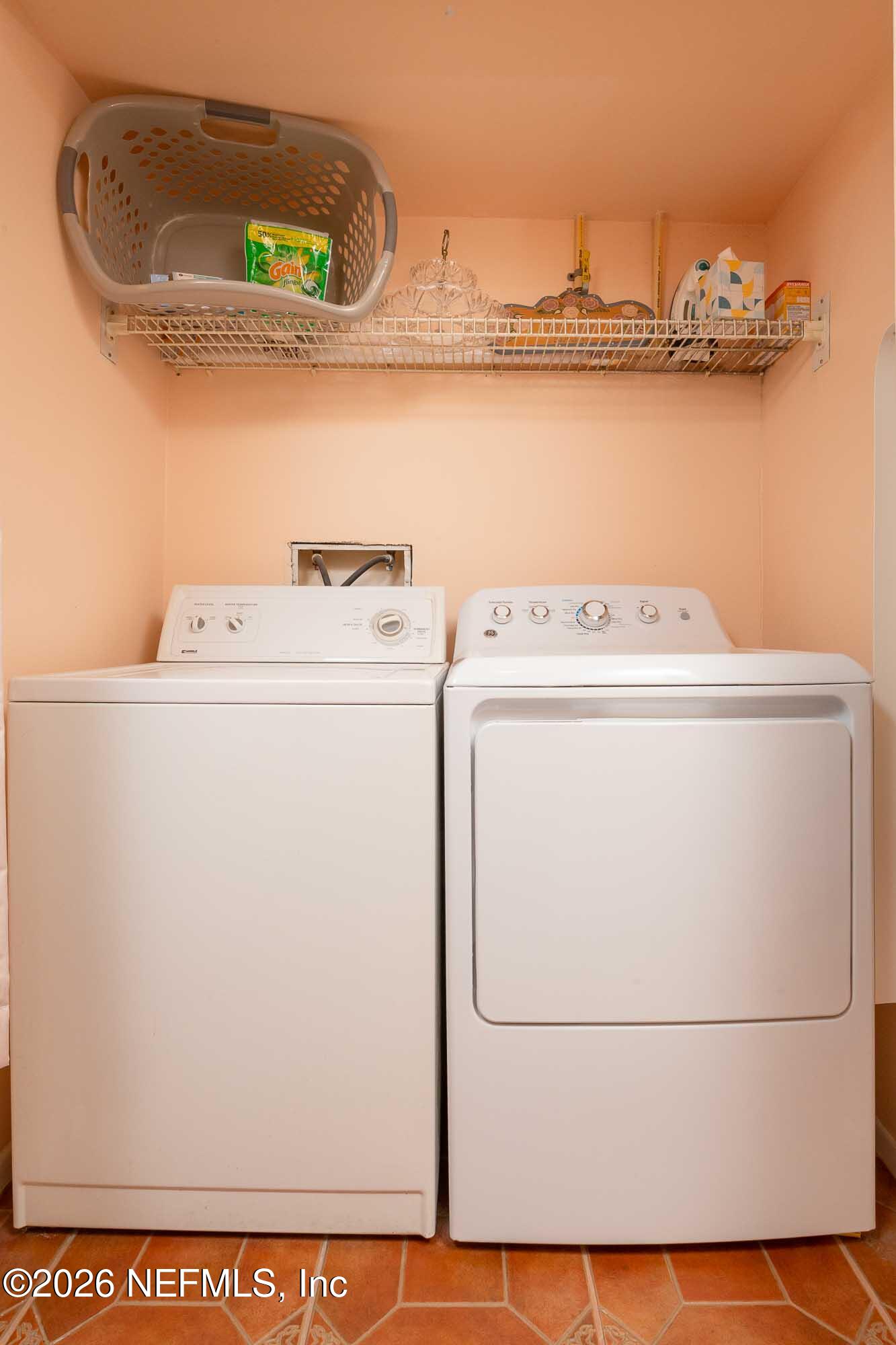 4 Ocean Trace Road, Unit 122 St. Augustine Beach, FL 32080 - Photo 46 of 48 a utility room with dryer and washer