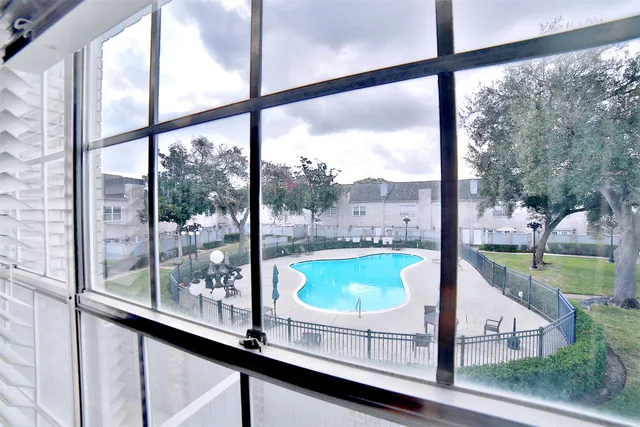 a view of a porch with a back yard