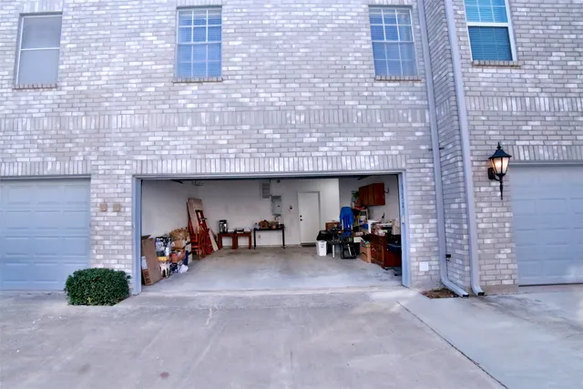 a view of a brick building with many windows