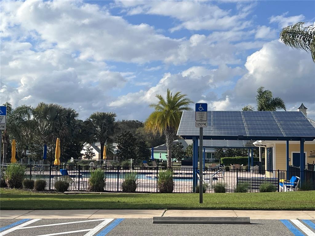 1010 Fiesta Key Circle Lady Lake, FL 32159 - Photo 3 of 6 a view of a building and car parked