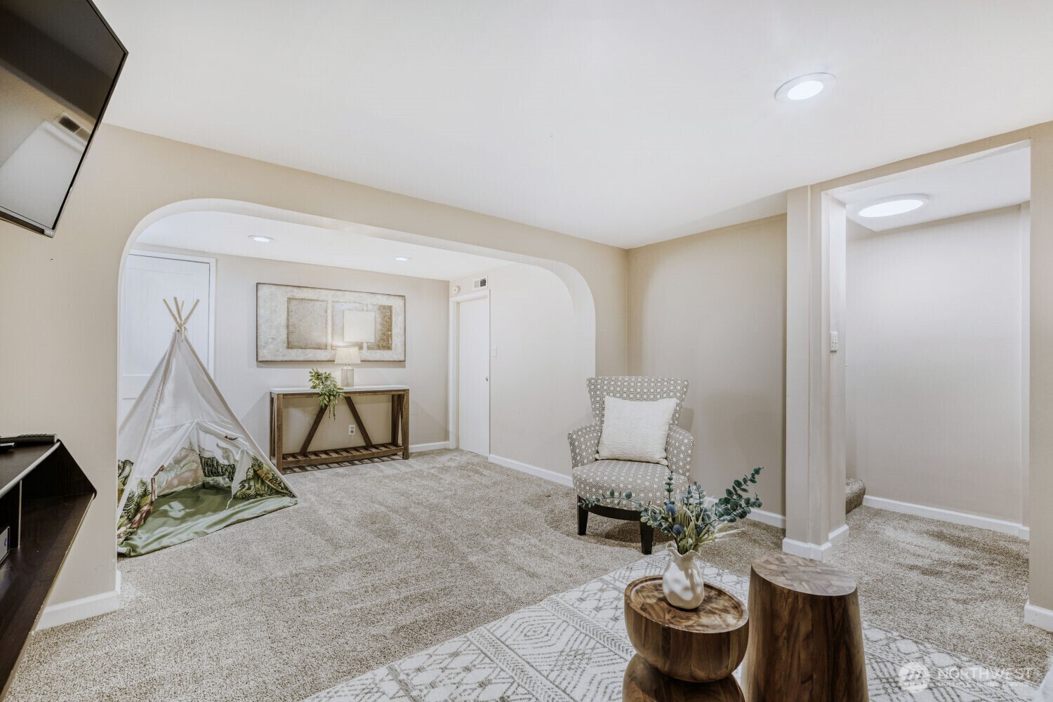 348 Northeast 57th Street Seattle, WA 98105 - Photo 14 of 28 a living room with furniture and a wooden floor