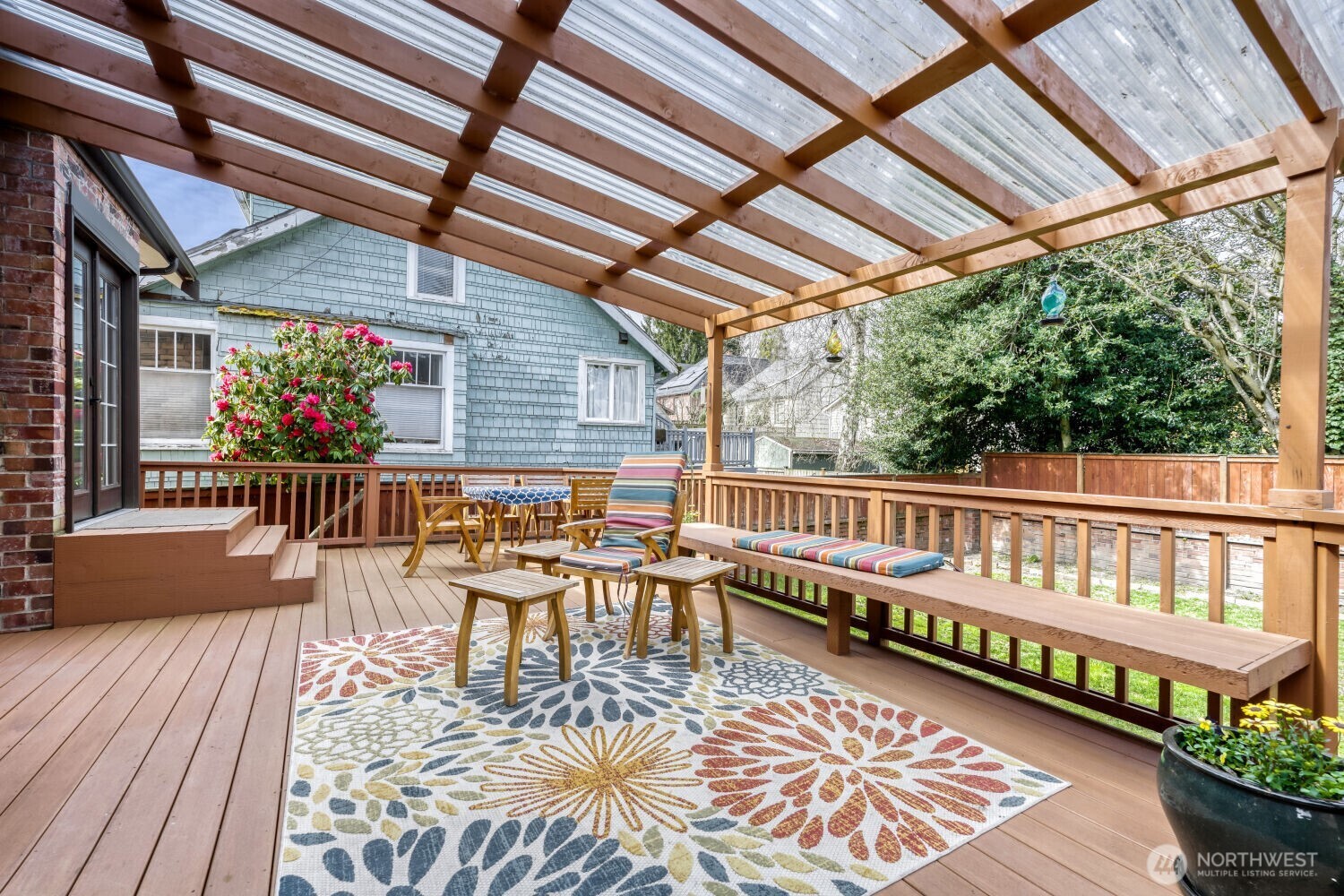 348 Northeast 57th Street Seattle, WA 98105 - Photo 24 of 28 a view of a chairs on the roof deck