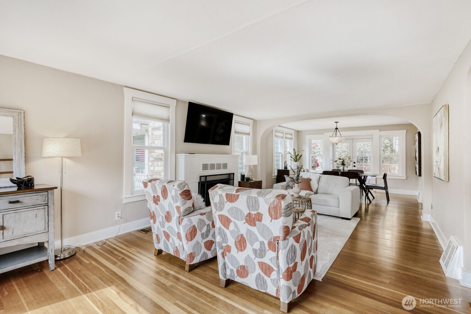 348 Northeast 57th Street Seattle, WA 98105 - Photo 7 of 28 a living room with furniture fireplace and a flat screen tv