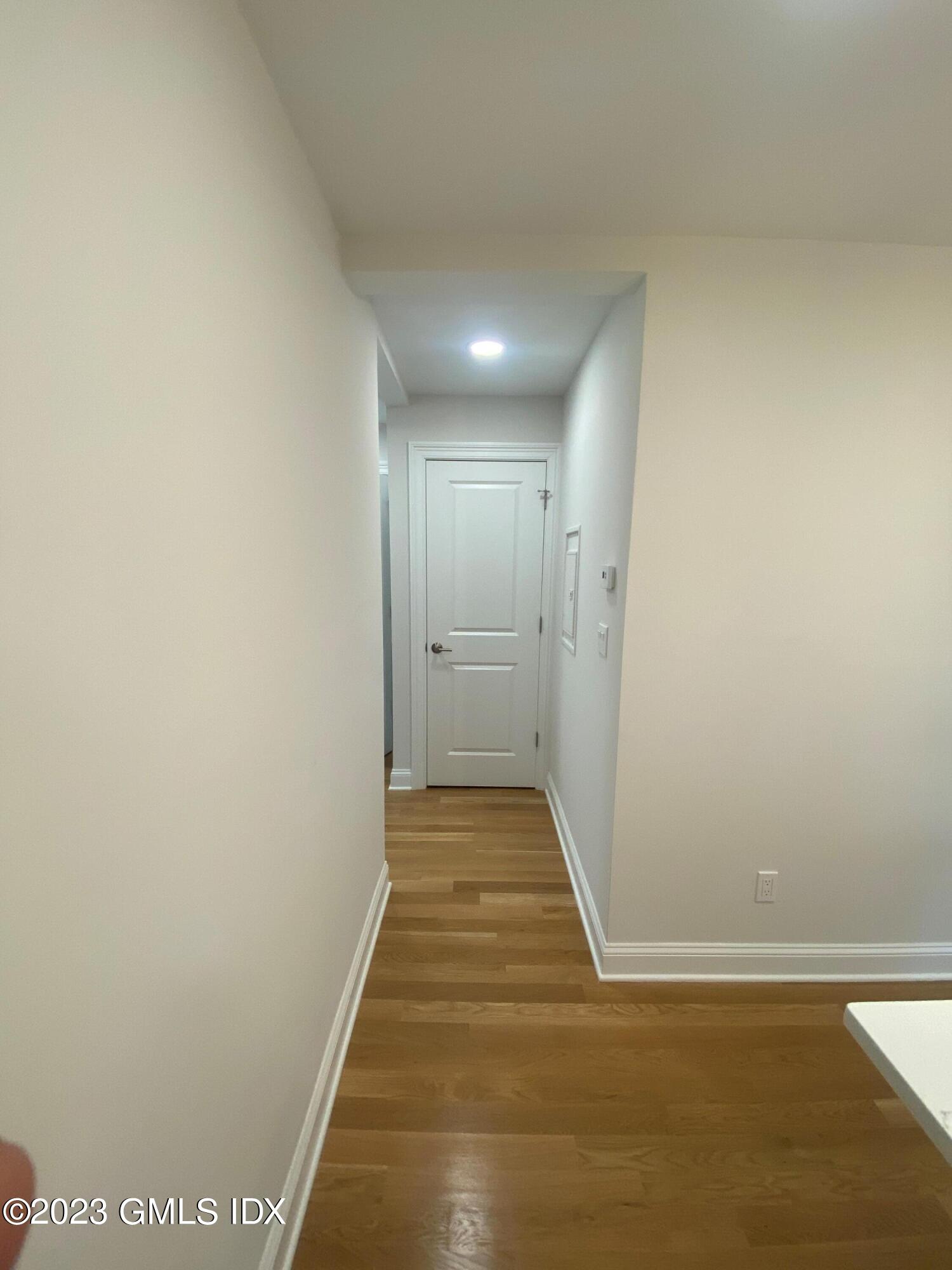 36 Arch Street, Unit 2A Greenwich, CT 06830 - Photo 4 of 9 a view of an empty room