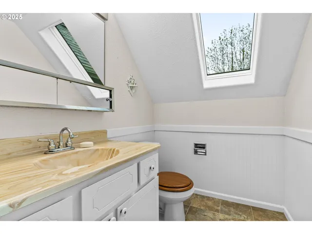 a view of a room that has a window