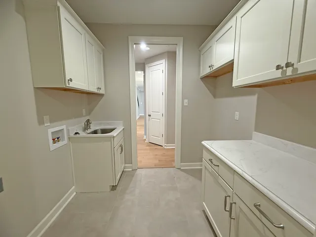 a picture of a wall with a white wall and a painting