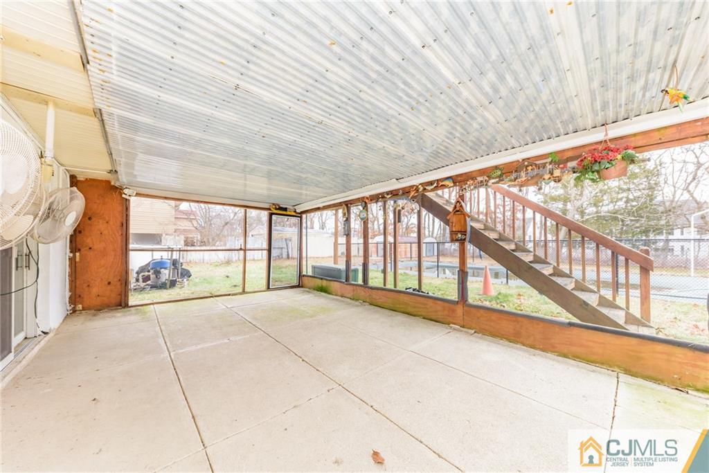 111 Greymoor Road Howell, NJ 07731 - Photo 22 of 25 a view of an empty room with a balcony