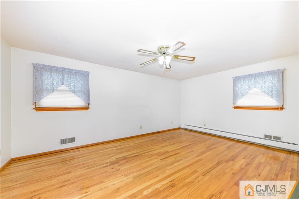 111 Greymoor Road Howell, NJ 07731 - Photo 9 of 25 a view of an empty room with a window