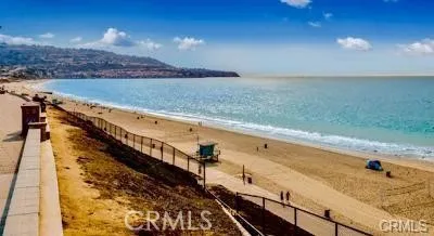 a view of a balcony with an ocean view