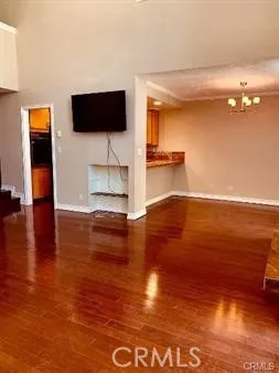 a view of a living room with a flat screen tv