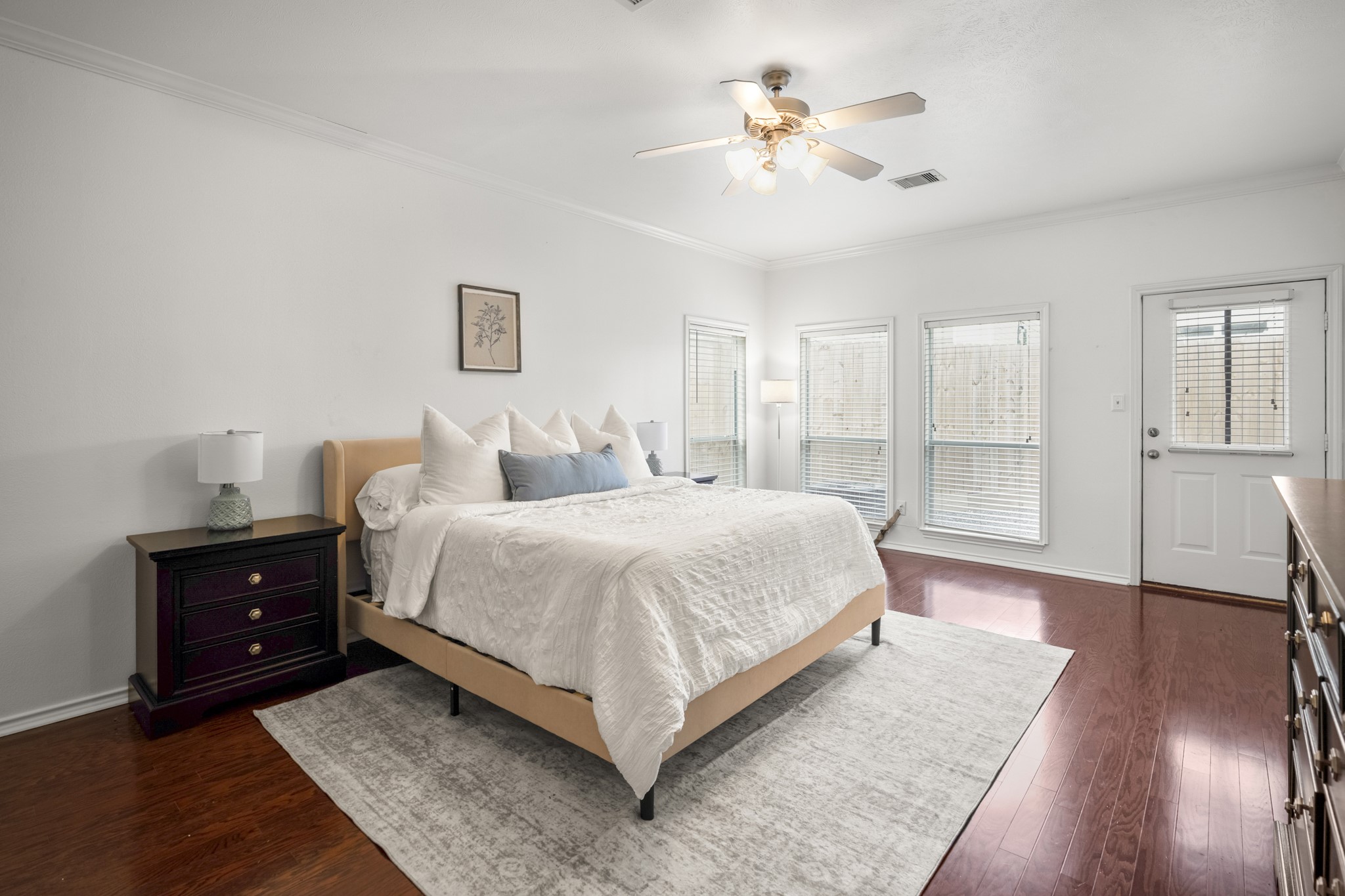 3209 Chenevert Street Houston, TX 77004 - Photo 11 of 32 Generously sized primary bedroom providing a peaceful escape from city life.