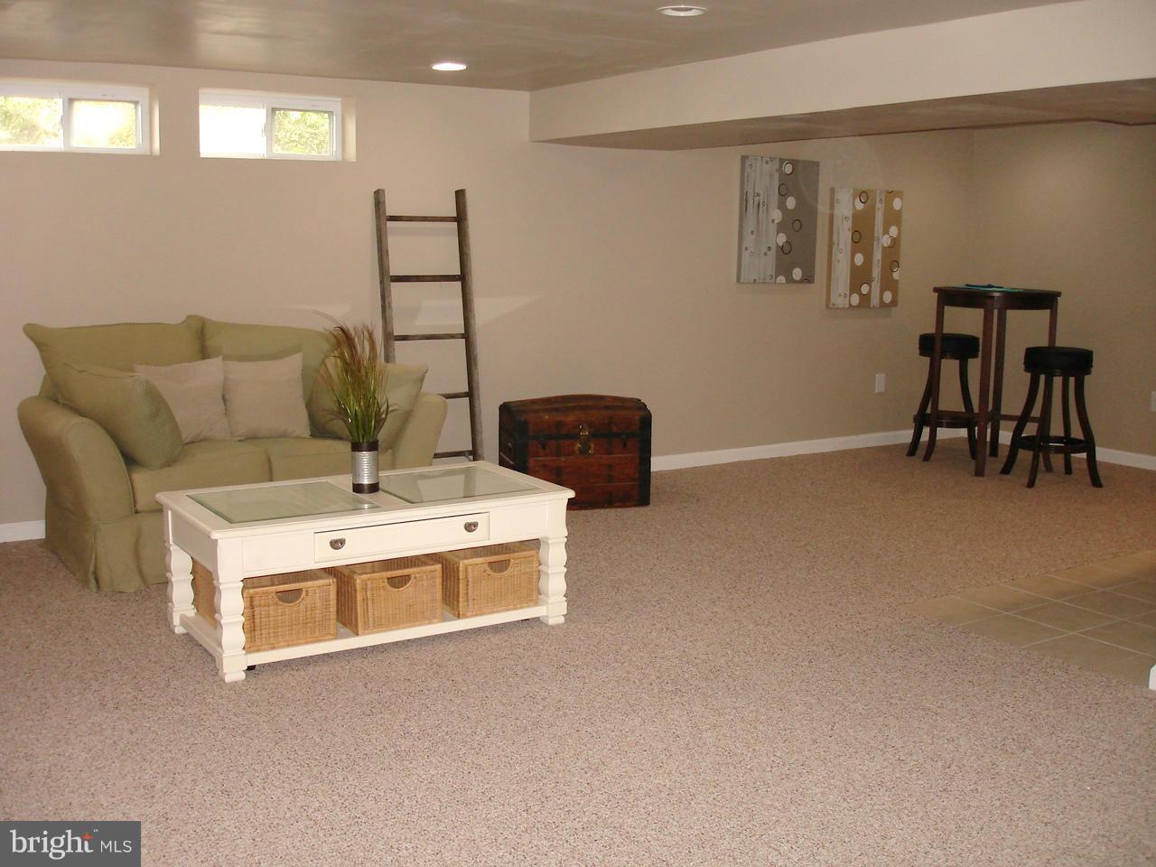 9138 Covered Bridge Road Baltimore, MD 21234 - Photo 12 of 30 HUGE LOWER LEVEL FAMILY ROOM / WET BAR