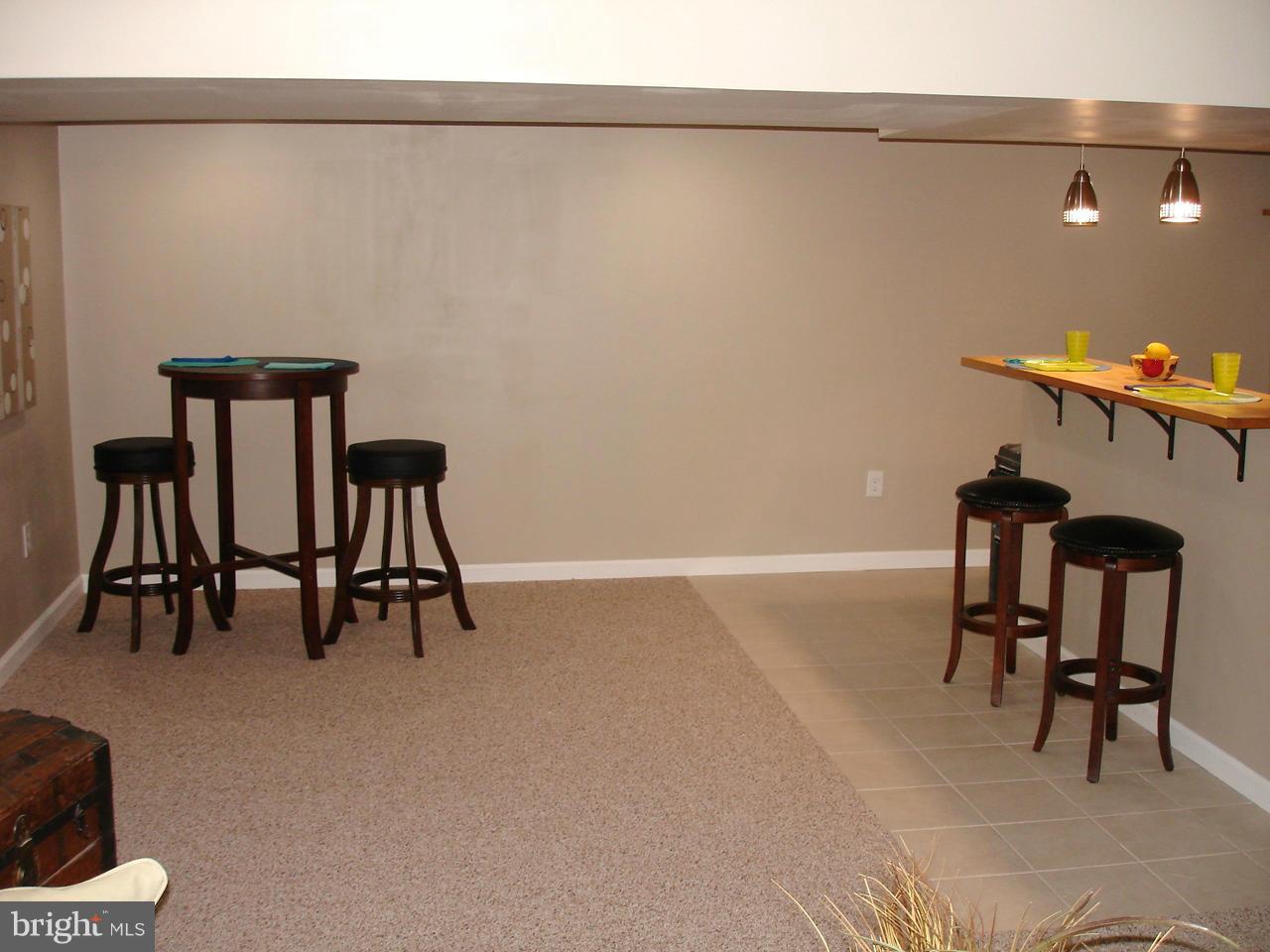 9138 Covered Bridge Road Baltimore, MD 21234 - Photo 13 of 30 HUGE LOWER LEVEL FAMILY ROOM / WET BAR