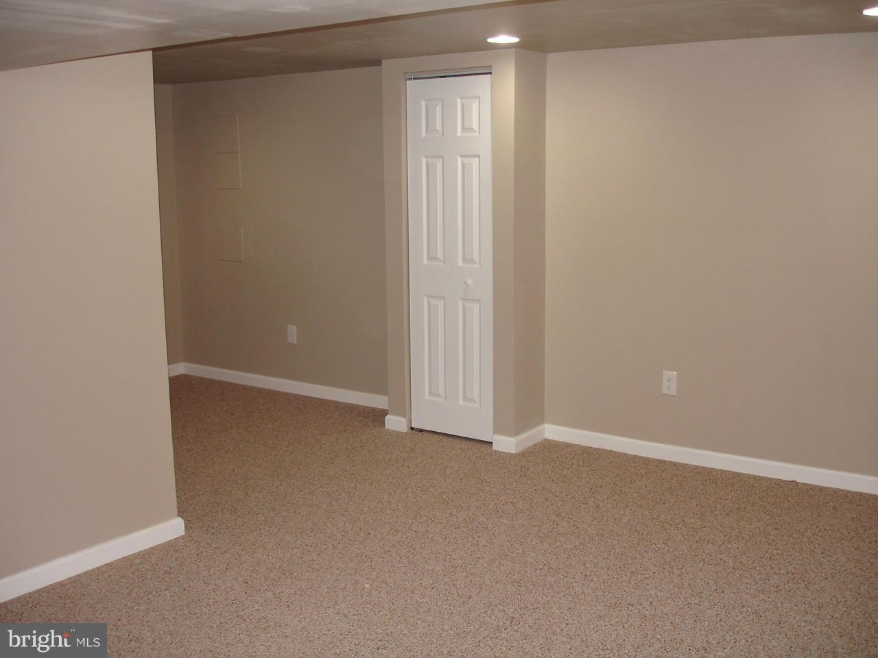 9138 Covered Bridge Road Baltimore, MD 21234 - Photo 17 of 30 LOWER LEVEL BEDROOM/ KIDS PLAYROOM/ OFFICE