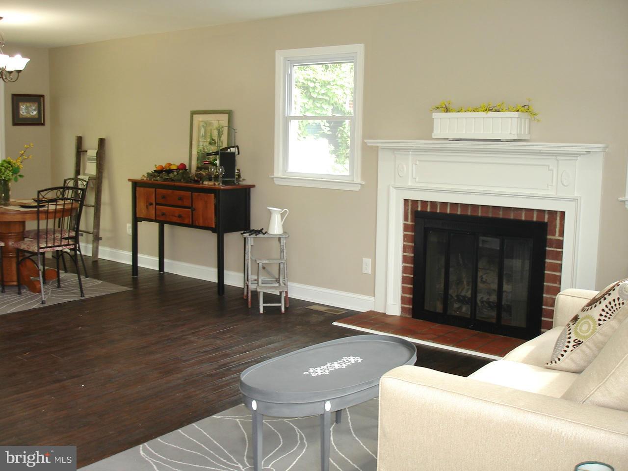 9138 Covered Bridge Road Baltimore, MD 21234 - Photo 3 of 30 WOOD FLOORS / WOOD BURNING FIREPLACE