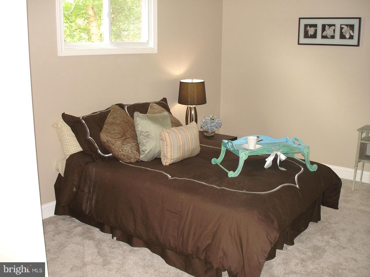 9138 Covered Bridge Road Baltimore, MD 21234 - Photo 23 of 30 MASTER BEDROOM AND FULL BATH ON MAIN LEVEL