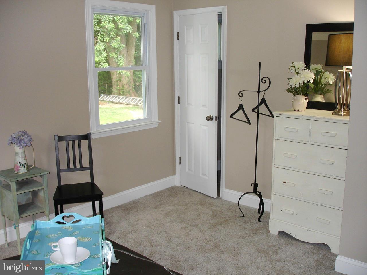 9138 Covered Bridge Road Baltimore, MD 21234 - Photo 24 of 30 SNUGGLE IN TO THIS WARM COZY ROOM