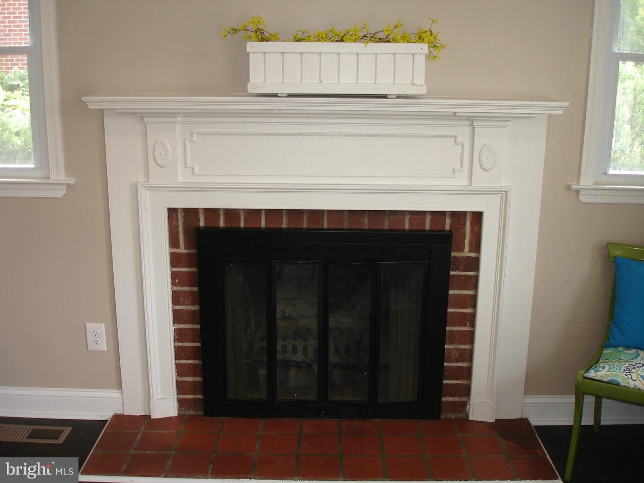9138 Covered Bridge Road Baltimore, MD 21234 - Photo 7 of 30 WOOD BURNING FIREPALCE AND NEW MANTELS