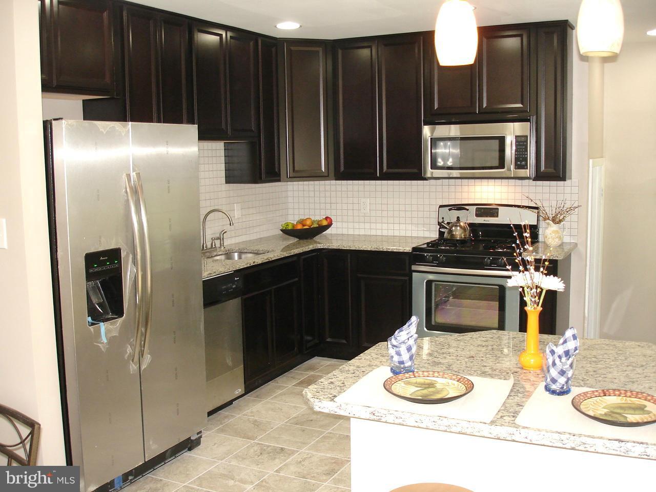 9138 Covered Bridge Road Baltimore, MD 21234 - Photo 9 of 30 GRANITE COUNTERS/ STAINLESS STL APPLS
