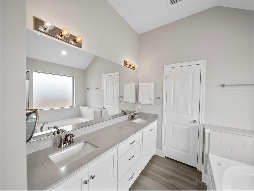 302 Pennington Road Josephine, TX 75173 - Photo 13 of 24 a bathroom with a double vanity sink mirror and