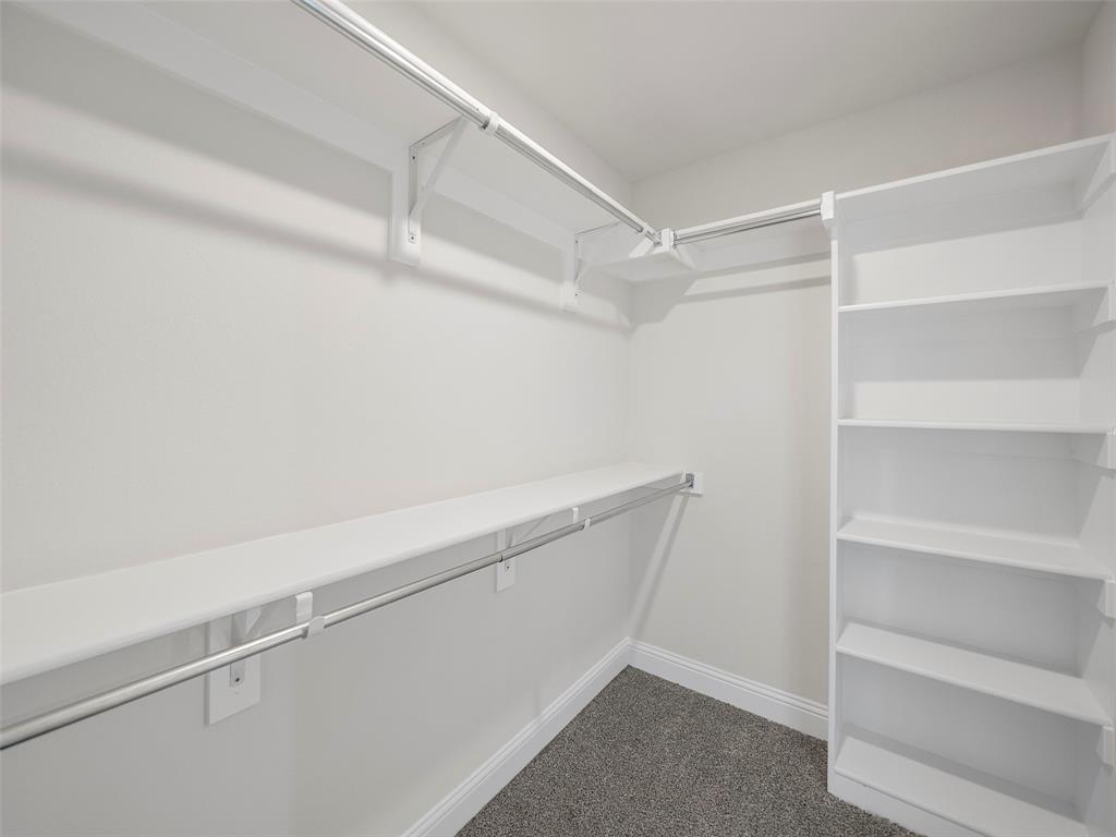 302 Pennington Road Josephine, TX 75173 - Photo 17 of 24 a view of an empty walk in closet