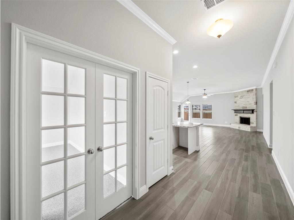 302 Pennington Road Josephine, TX 75173 - Photo 3 of 24 a living room with furniture and a wooden floor