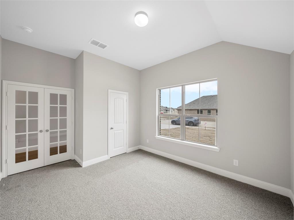 302 Pennington Road Josephine, TX 75173 - Photo 4 of 24 an empty room with a window