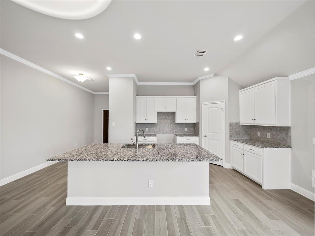302 Pennington Road Josephine, TX 75173 - Photo 6 of 24 a large bathroom with a granite countertop sink