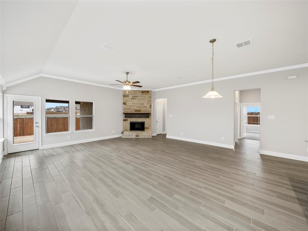 302 Pennington Road Josephine, TX 75173 - Photo 8 of 24 a view of empty room with wooden floor and window