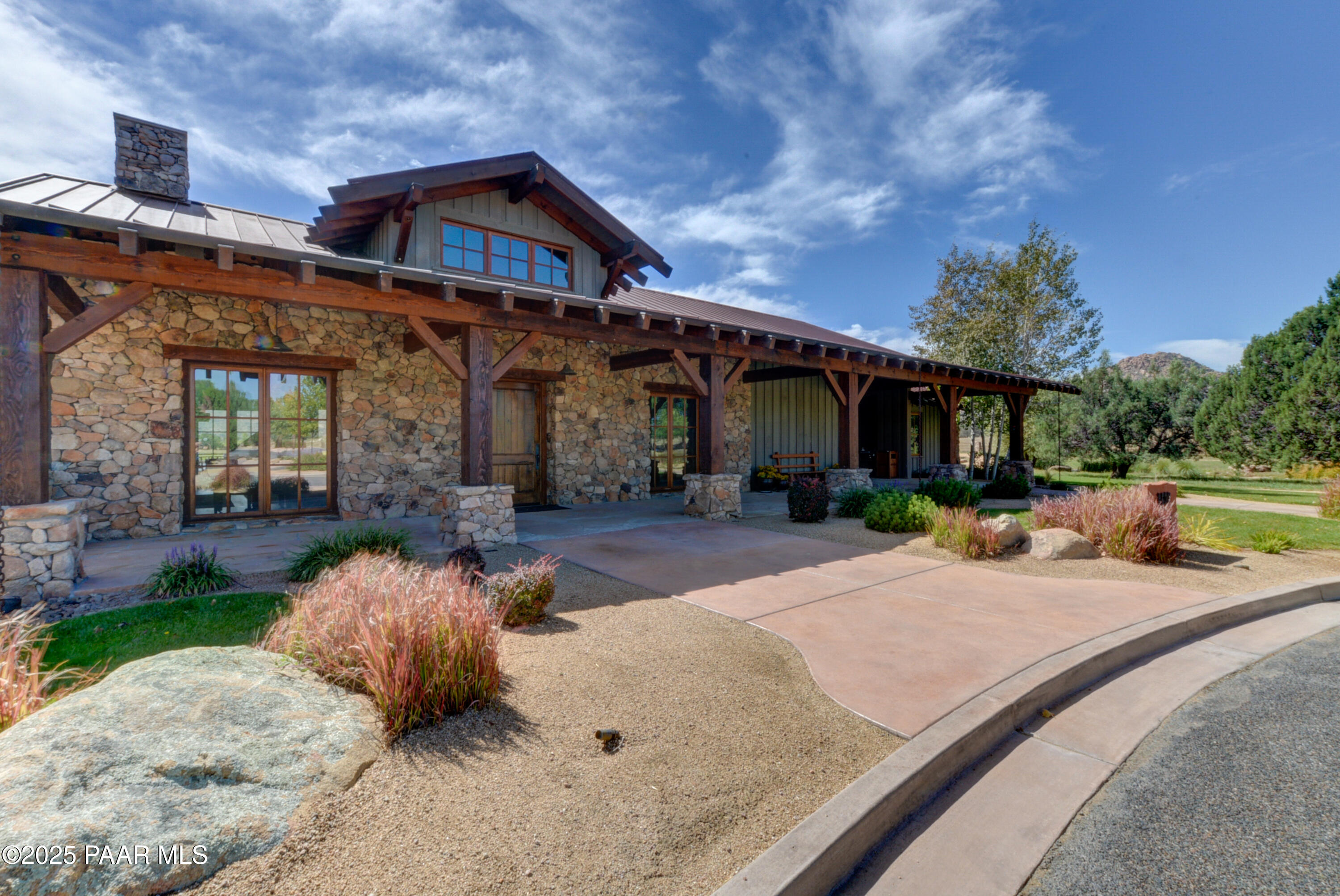 9875 North Equine Road Prescott, AZ 86305 - Photo 12 of 24 a front view of a house with garden